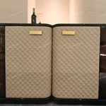 Curved Four-Door Sideboard with Quilted Upholstered Panels High-Gloss Burl Wood Veneer and Gold-Finish Metal Handles